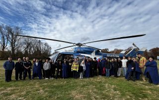 Criminal Justice students in front of Lifestar helicopter